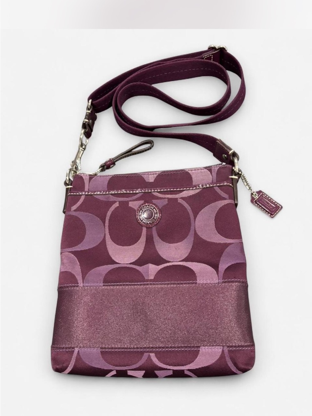 Coach Plum Purple Signature Crossbody Bag with original Hang Tag.   EUC